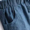 0–12 miesięcy | komplet składający się z dzianinowej koszulki polo w paski i szortów