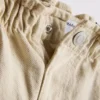 1,5–8 lat | Jeansy typu „paperbag” z kwiatowym haftem