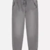 7–15 lat | jeansy typu sweatpants z podwiniętymi nogawkami