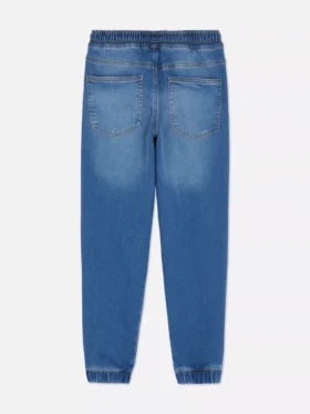 7–15 lat | jeansy typu sweatpants z podwiniętymi nogawkami