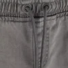 7–15 lat | jeansy typu sweatpants z podwiniętymi nogawkami