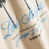 7–15 lat | T-shirt z nadrukiem palmy i fakturą