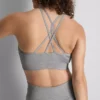 Bezszwowy, błyszczący top sportowy typu crop top
