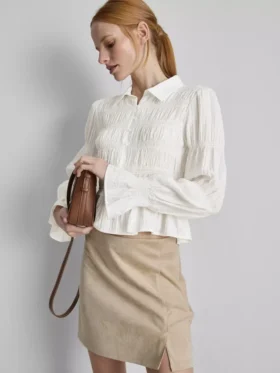 Bluzka z marszczonym dołem w stylu peplum