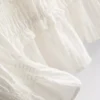 Bluzka z marszczonym dołem w stylu peplum