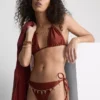 Figi bikini wiązane z boku z łańcuszkowymi detalami