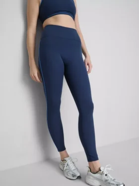 Gładkie legginsy sportowe z wzmocnieniem i detalami w postaci rurek