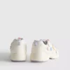 Grube sneakersy z kwiatowymi detalami