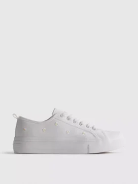 Haftowane sneakersy z motywem stokrotek