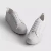 Haftowane sneakersy z motywem stokrotek