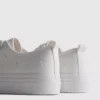 Haftowane sneakersy z motywem stokrotek
