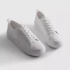 Haftowane sneakersy z motywem stokrotek