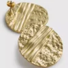 Kolczyki-sztyfty Paula Echevarría z teksturowanymi krążkami