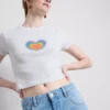 Koszulka dziecięca z motywem serca „Pride” z dużą zawartością bawełny