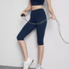 Legginsy capri z wysokim stanem, zapewniające płynne wsparcie podczas aktywności fizycznej
