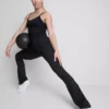 Legginsy sportowe z wysokim stanem, gładkim wsparciem i rozszerzanymi nogawkami