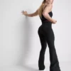 Legginsy sportowe z wysokim stanem, gładkim wsparciem i rozszerzanymi nogawkami