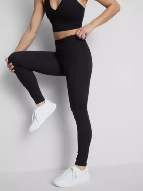 Legginsy sportowe z wysokim stanem, zapewniające płynne wsparcie