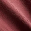 Luźna koszulka z okrągłym dekoltem i przewiewnym materiałem