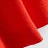 Luźna koszulka z okrągłym dekoltem i przewiewnym materiałem