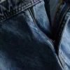 Luźne jeansy cargo o średniej wysokości w pasie
