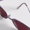 Owalne okulary przeciwsłoneczne z przyciemnianymi szkłami w stylu lat 90.