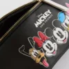 Saszetka Disney z Myszką Miki i przyjaciółmi z imitacji skóry