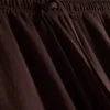 Spodnie z teksturowanego materiału o szerokich nogawkach