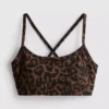 Sportowy top typu crop top z tyłem typu racerback w panterkę