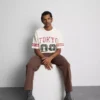 T-shirt z krótkim rękawem i postarzanym nadrukiem z Tokio