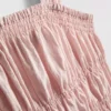 Top bez rękawów z marszczonym dołem w stylu peplum