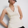 Top bez rękawów z peplum i dekoltem w serek