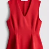 Top bez rękawów z peplum i dekoltem w serek