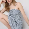 Top na ramiączkach z marszczonym peplum w kratkę