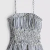 Top na ramiączkach z marszczonym peplum w kratkę