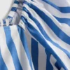 Top z paskami i bufiastymi rękawami w stylu bardot