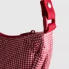Torba na ramię typu „saddle”