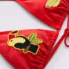 Trójkątny top bikini z motywem tukana